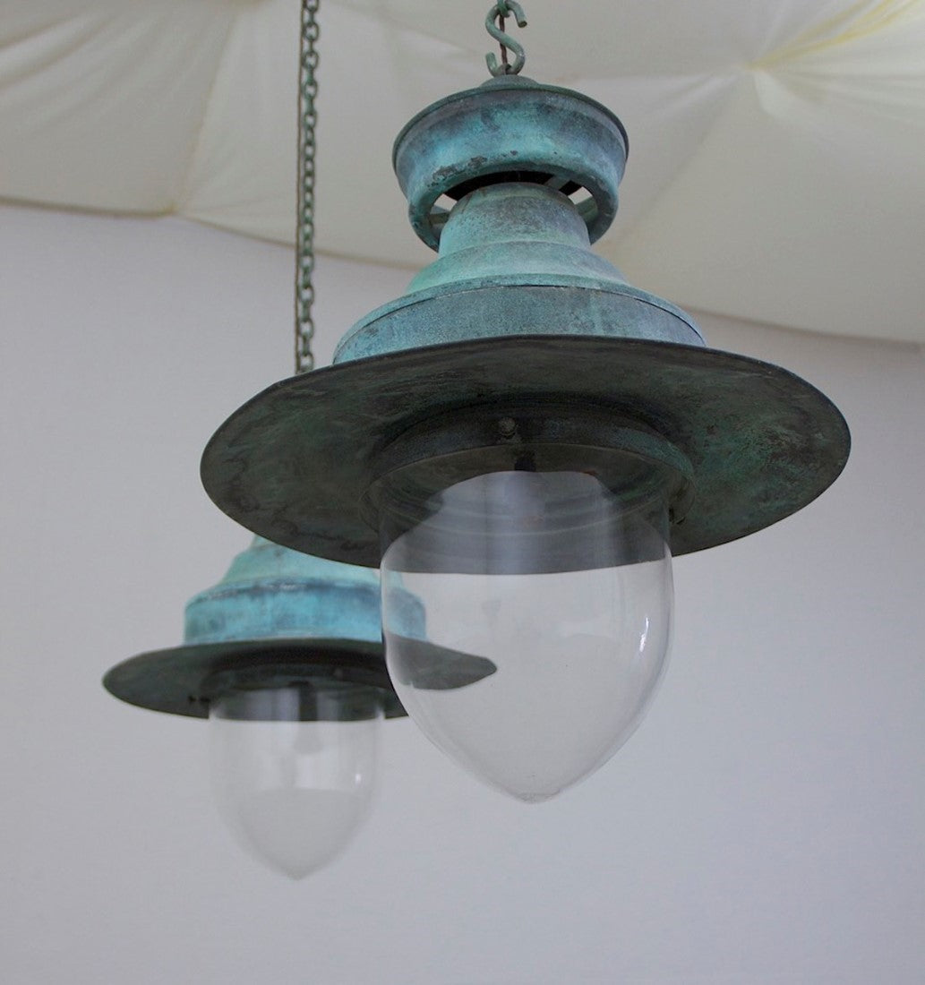 A large pair of copper station lights