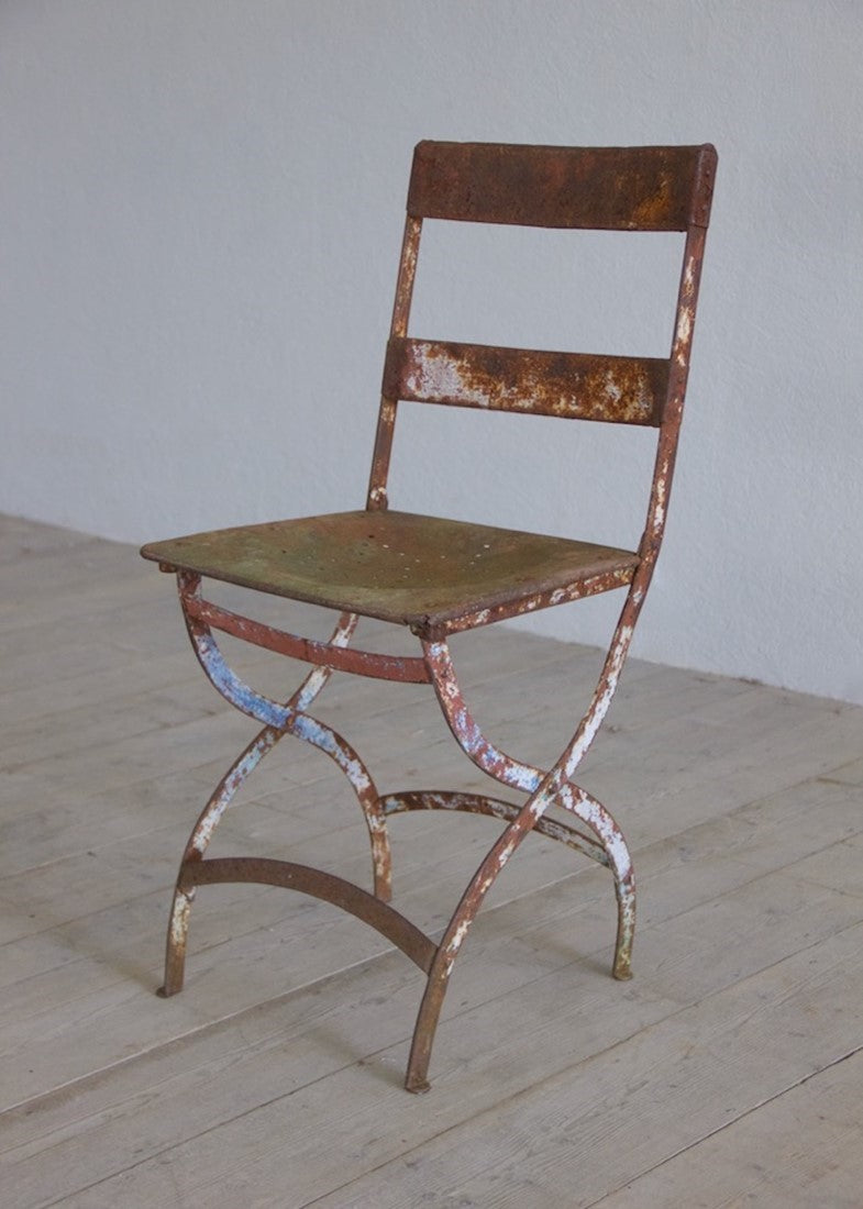 A set of six iron chairs