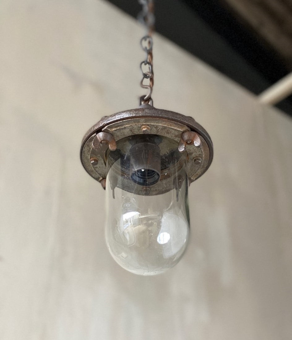An industrial iron pendant light