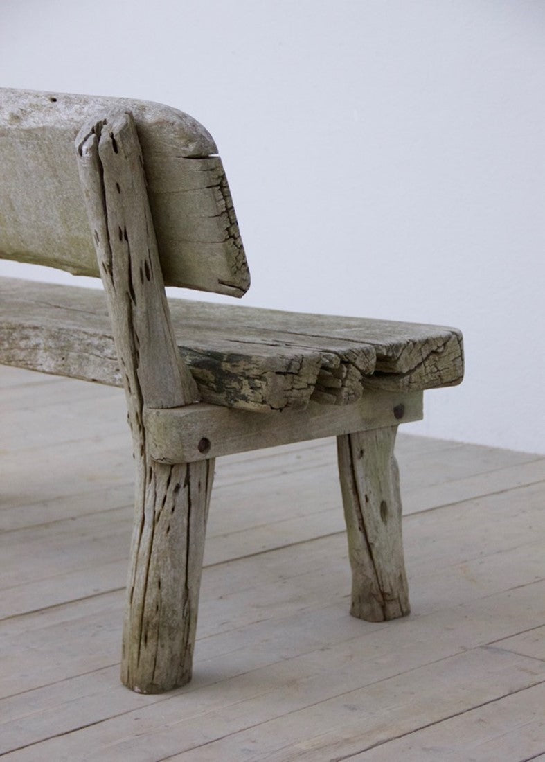 A rustic oak bench