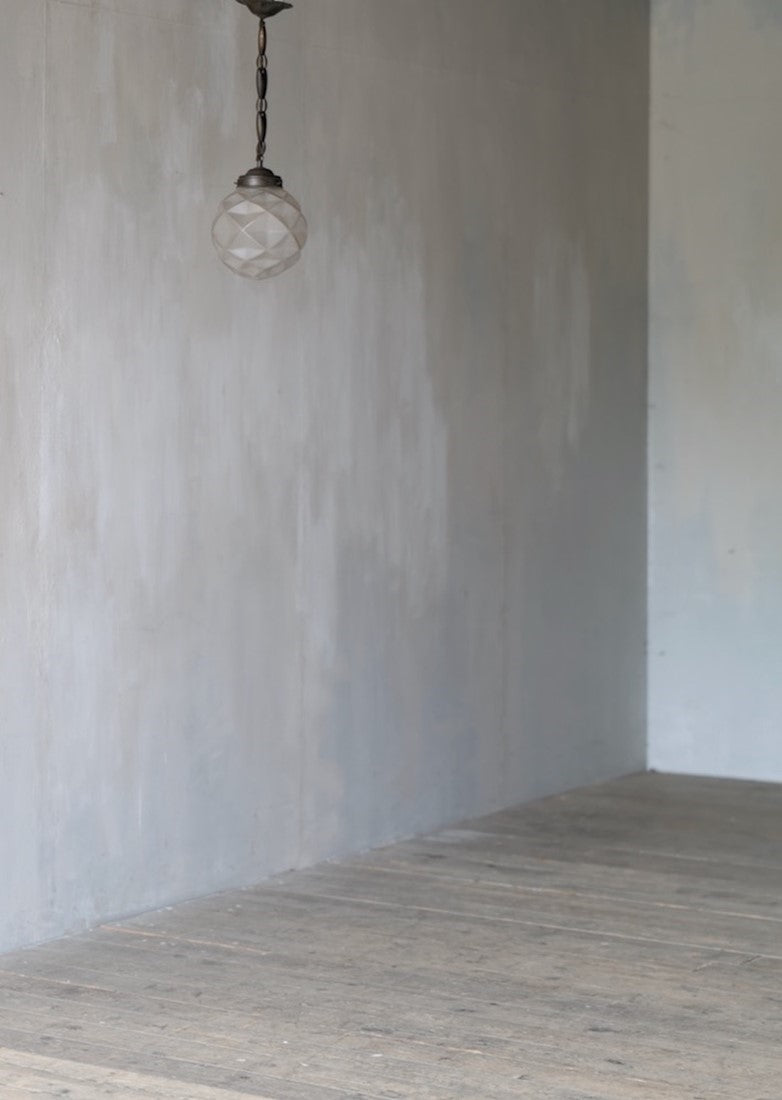 A geometric globe pendant light