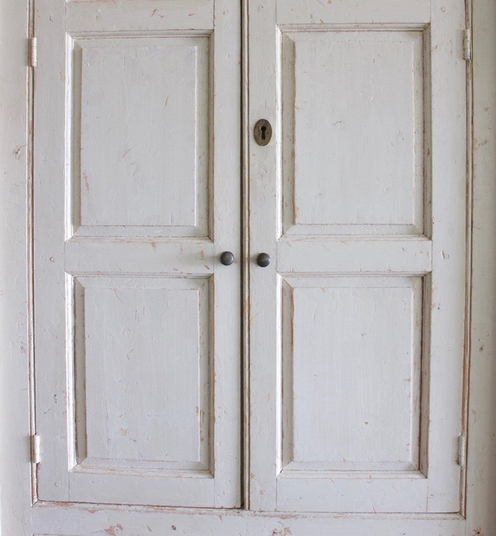 A pair of C18th cupboards