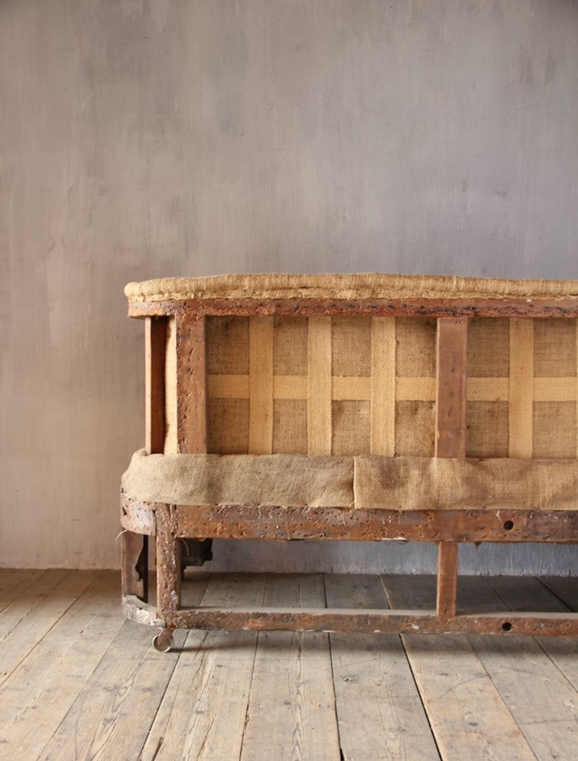 A pair of 19th century sofas from Penrhyn castle, Wales