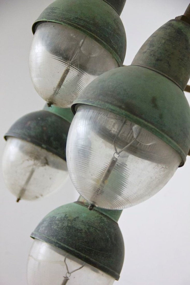 A run of 10 Holophane wall lights