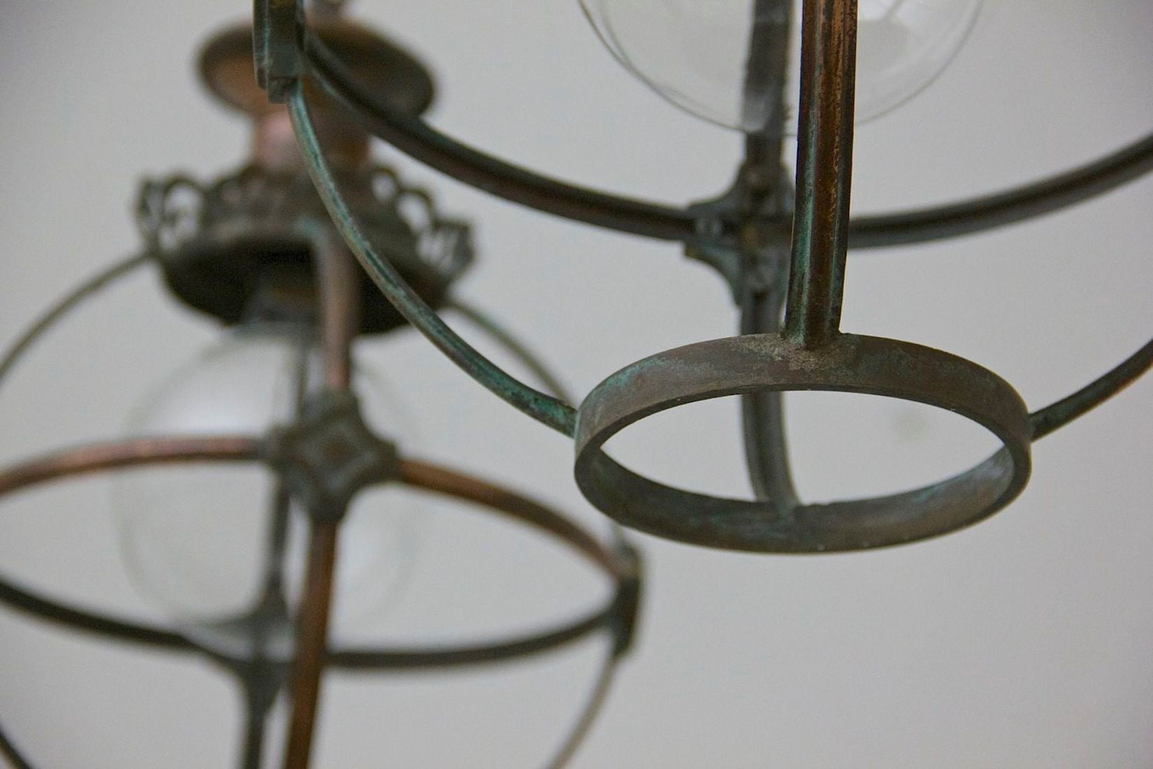 A pair of copper globe lanterns