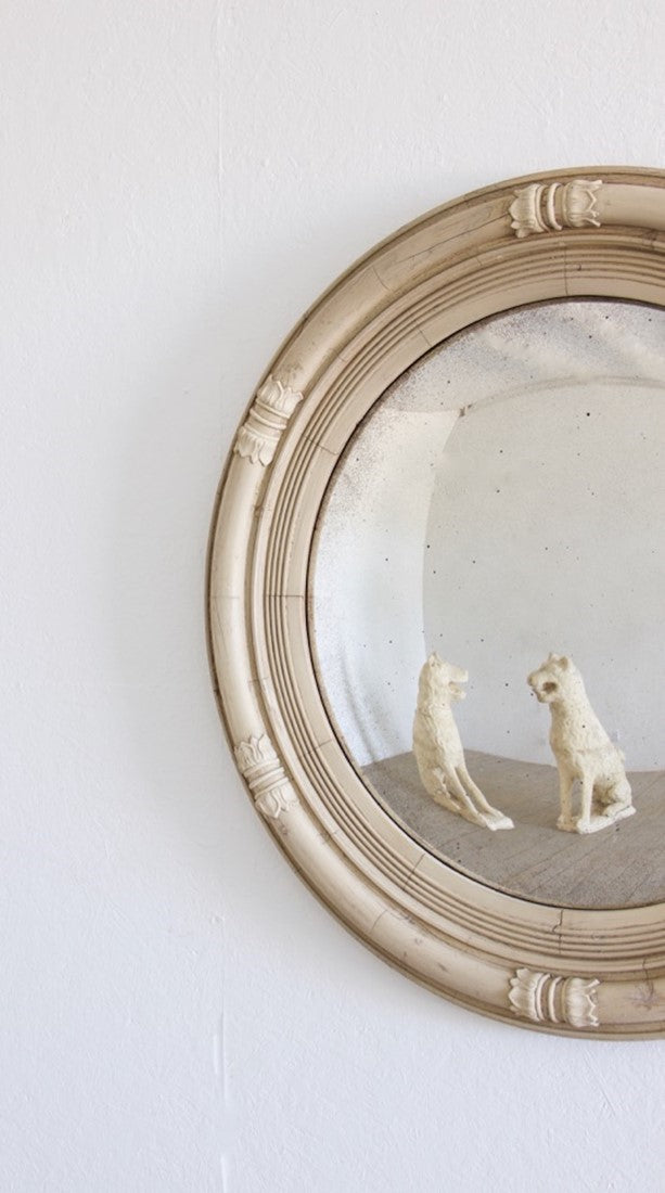 A Regency-style convex mirror