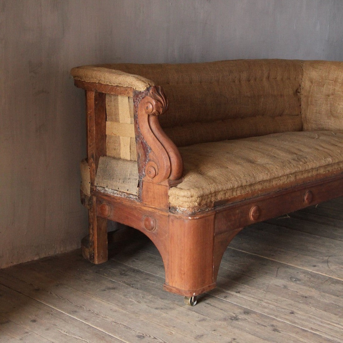 A pair of 19th century sofas from Penrhyn castle, Wales