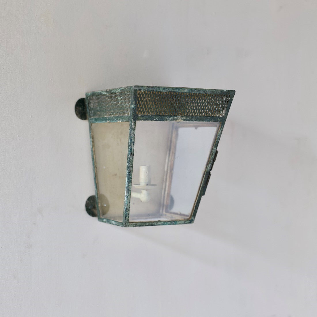 A simple estate-made wall lantern