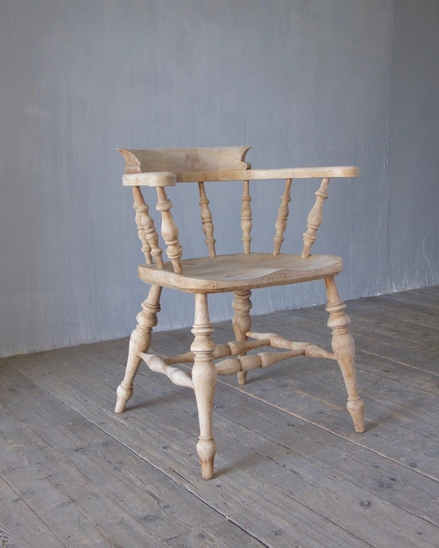 A set of 8 captain's chairs