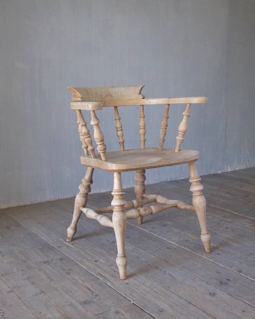A set of 8 captain's chairs