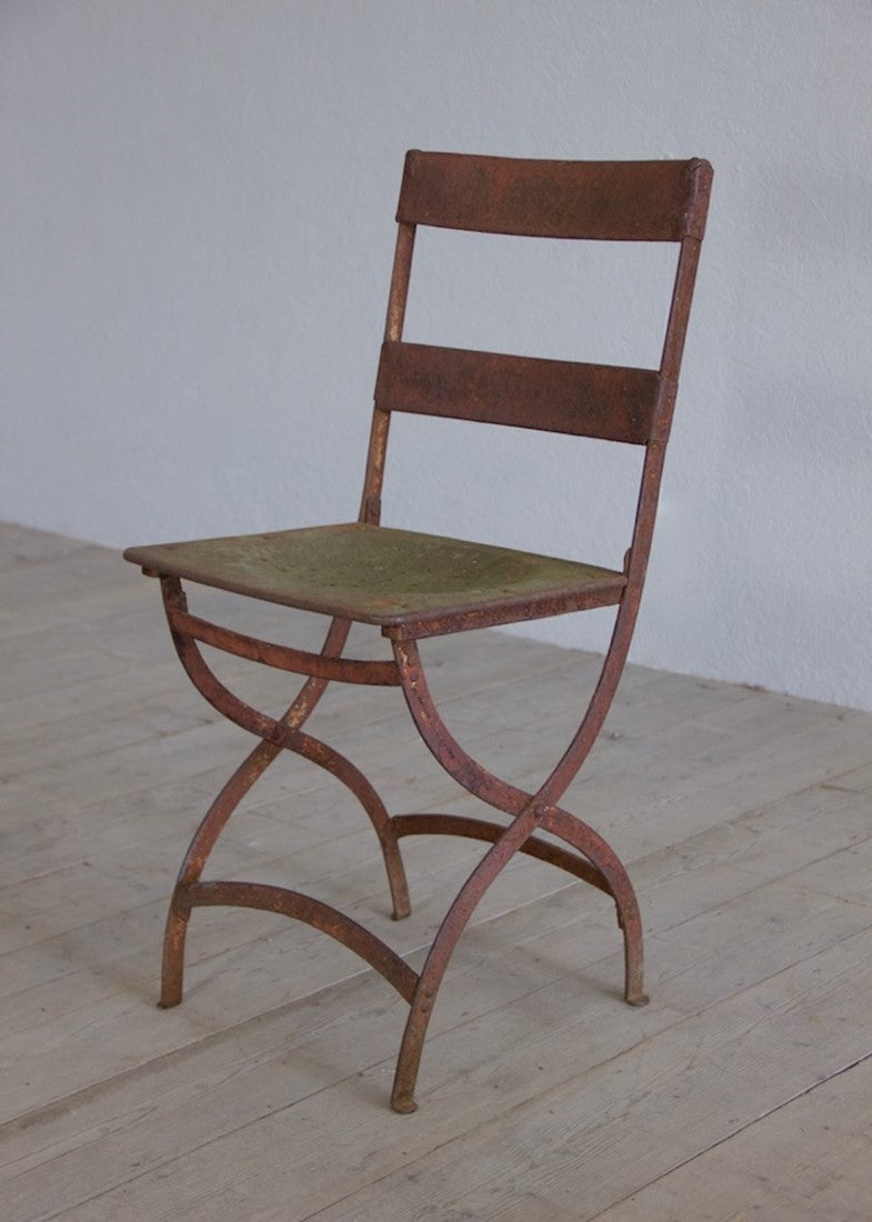 A set of six iron chairs