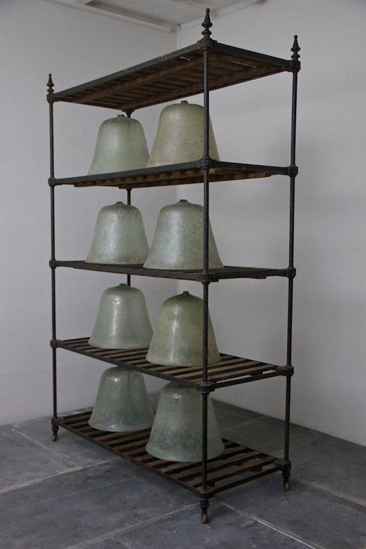 8 large early C20th melon cloches