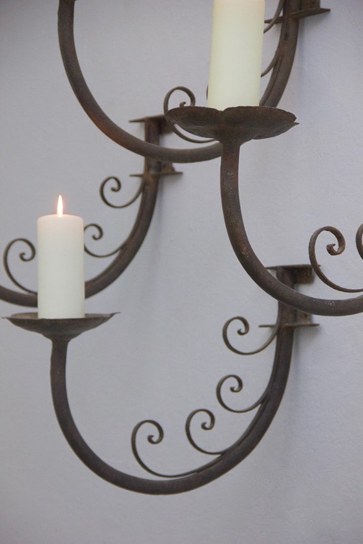 A set of 4 iron wall prickets
