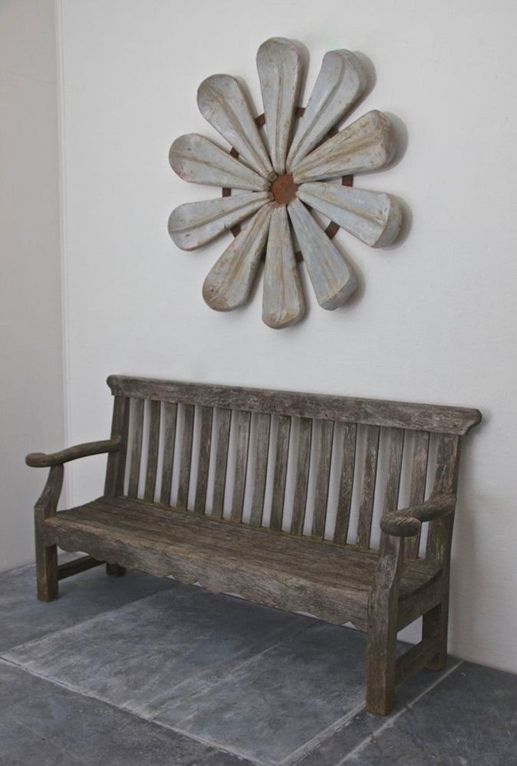 A 1920s English oak garden bench