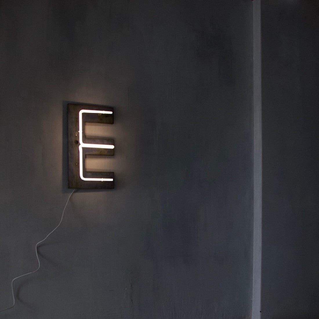 An original 1930's neon E