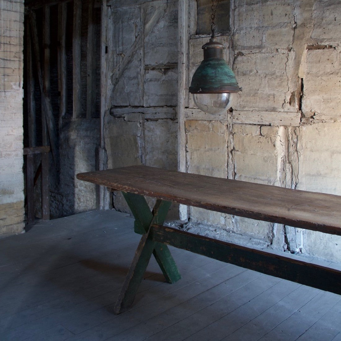 An industrial copper pendant light
