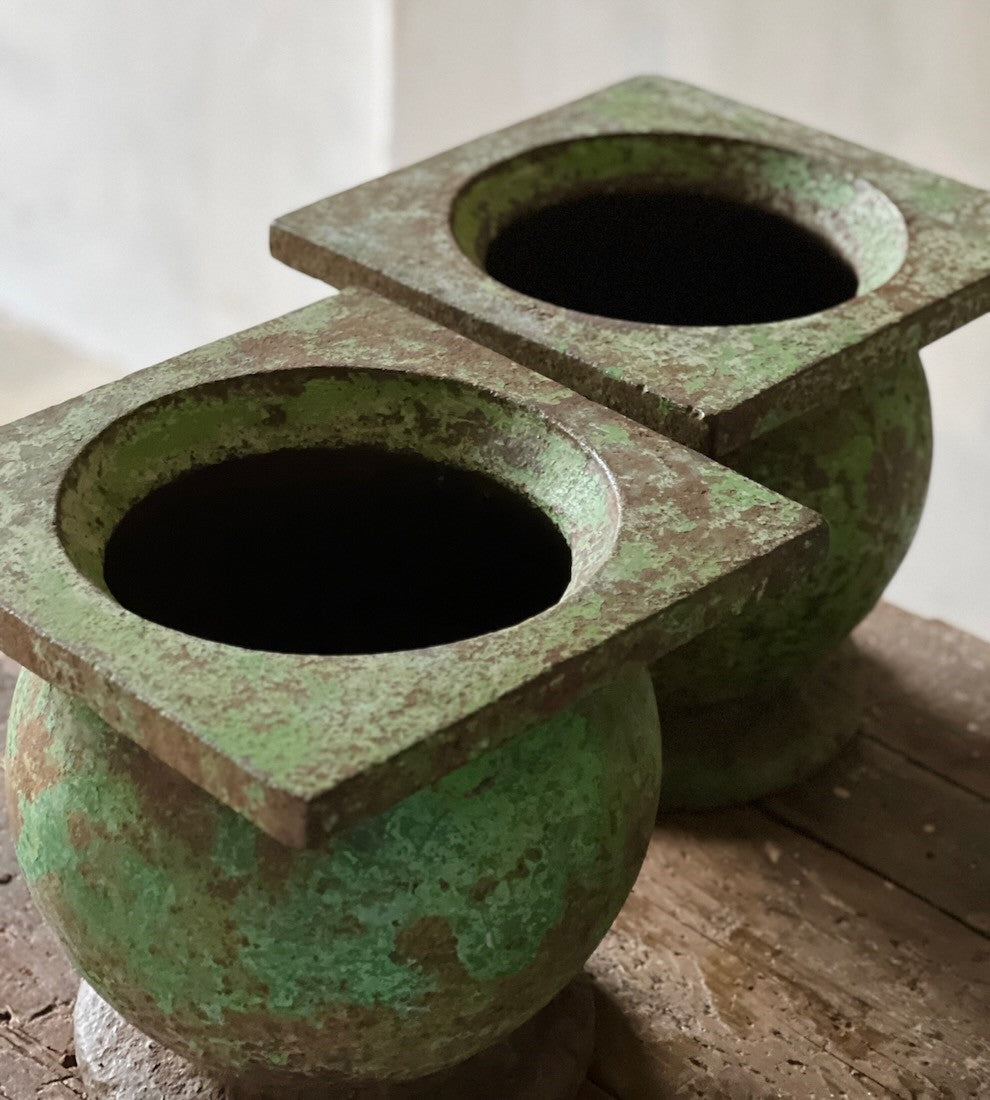 A pair of geometric planters