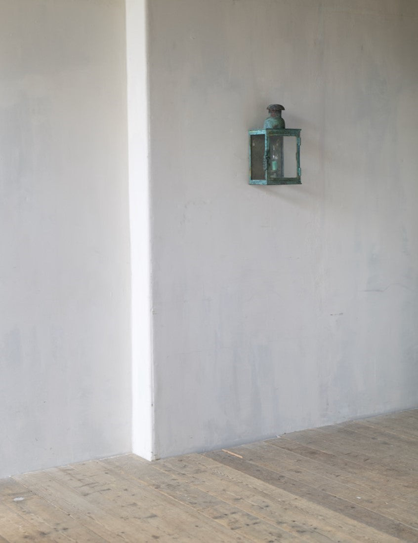 A verdigris bronze wall lantern