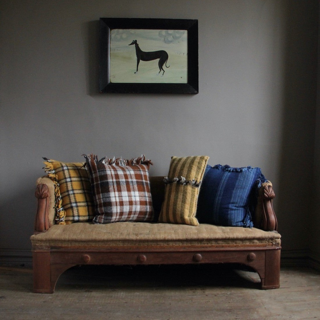 A pair of 19th century sofas from Penrhyn castle, Wales