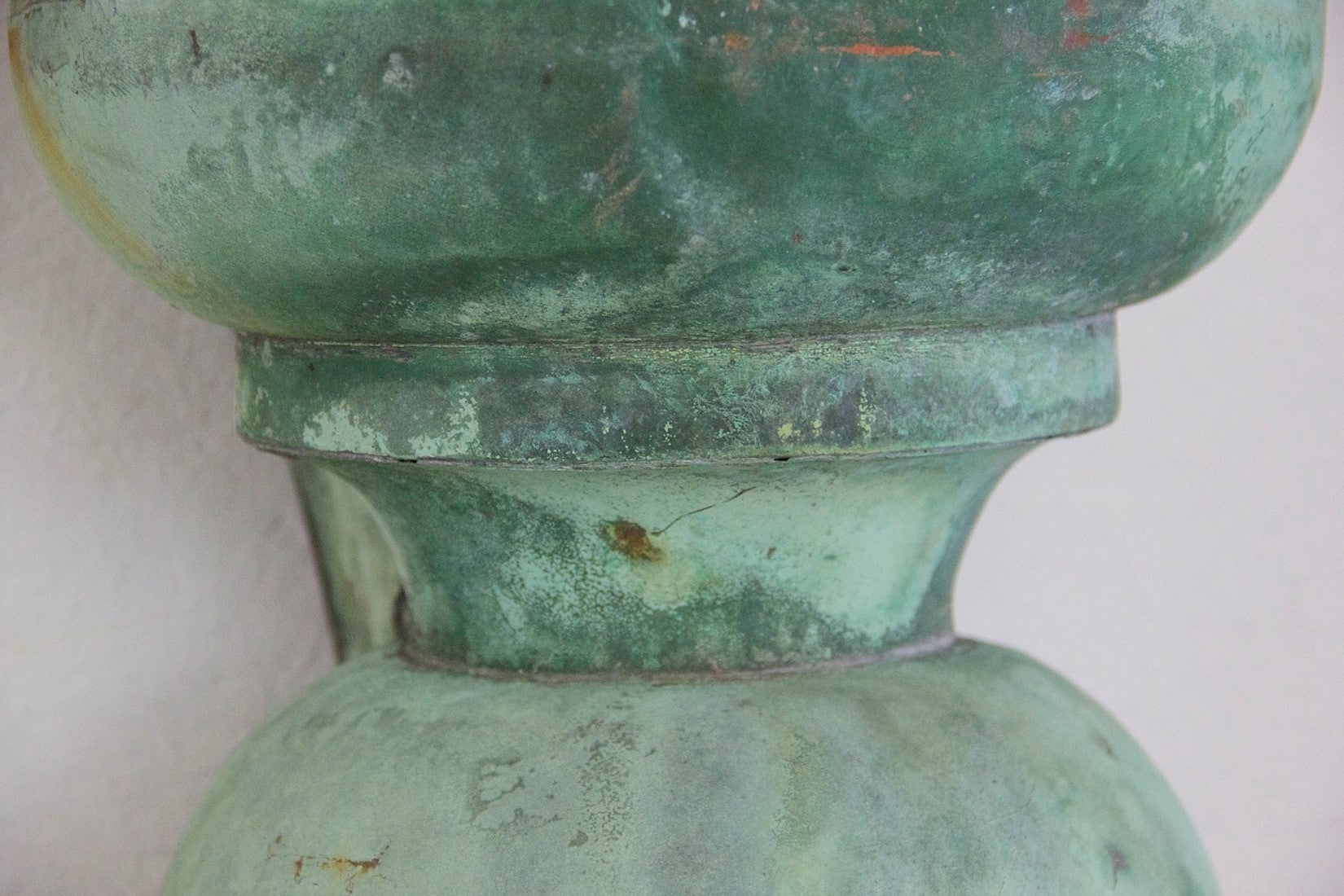 A pair of C19th copper torcheres
