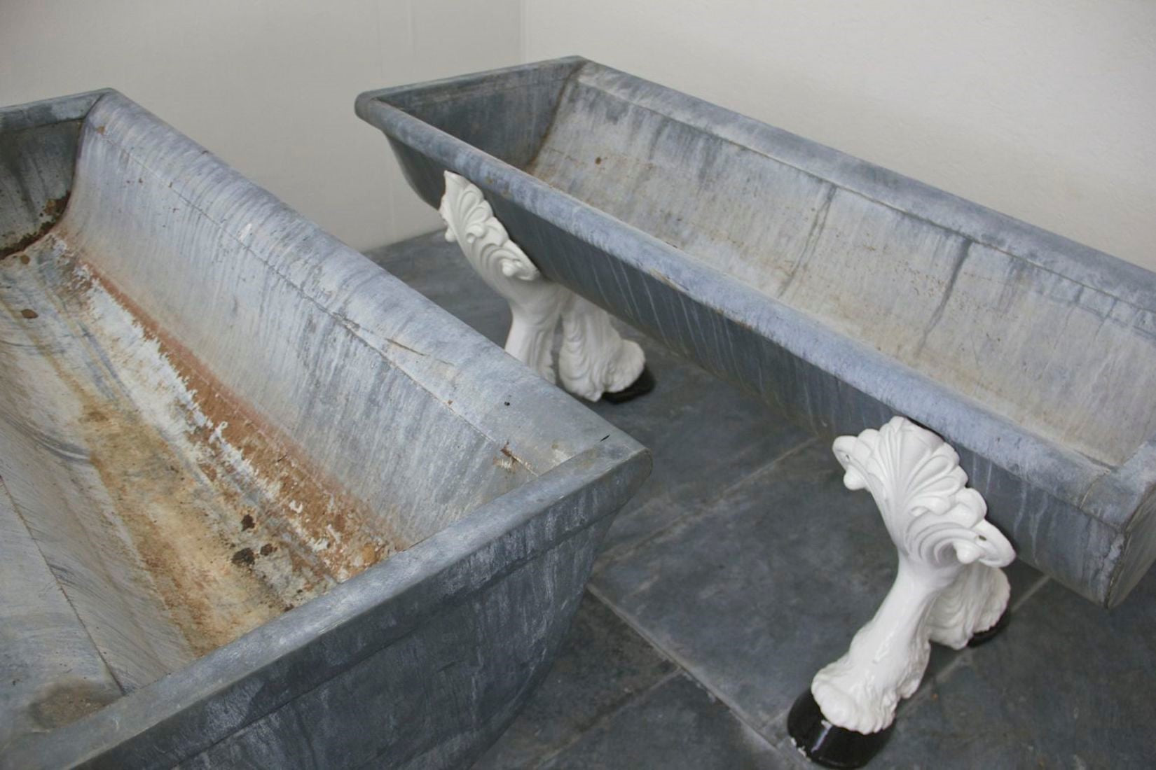 A pair of c19th drinking troughs